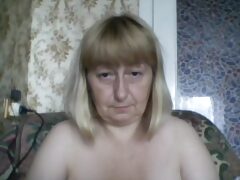 Caught in the act, a mature woman frantically hides her private parts after forgetting to close a webcam. Unintentional comedy ensues.